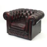 Thomas Lloyd, Chesterfield club chair with ox blood leather button back upholstery, 72.5cm H x 110cm