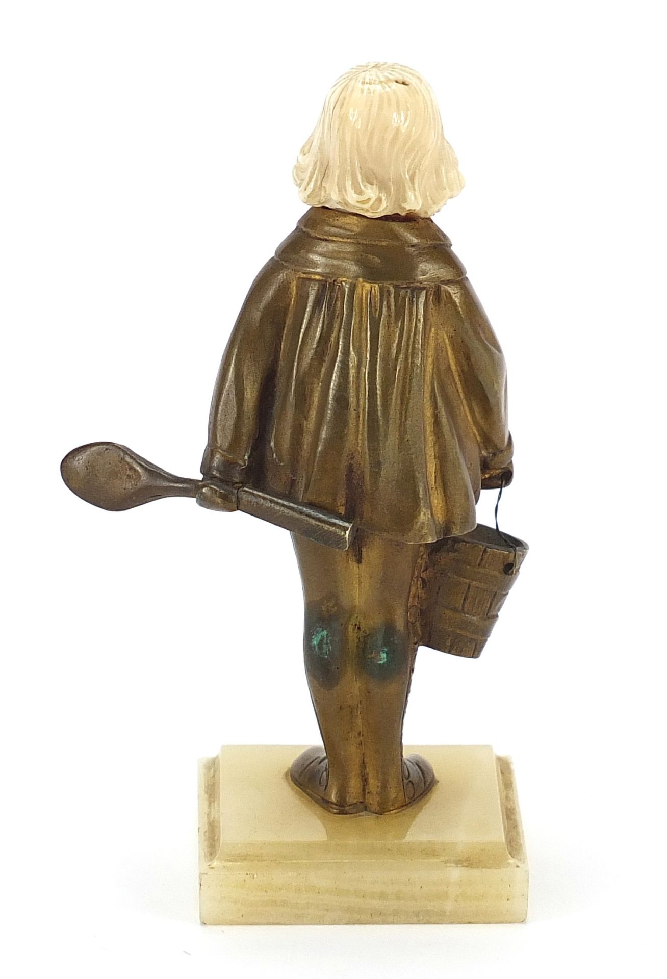 Art Deco gilt bronze and ivory figurine of a young girl holding a spoon and bucket, raised on a - Bild 3 aus 6