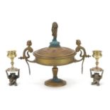 Novelty pair of silver plated and brass monkey design candlesticks and a classical tazza and cover