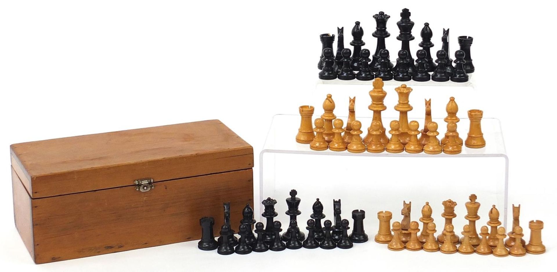 Two Boxwood and ebony design Staunton pattern chess sets with pine crate, the largest pieces each