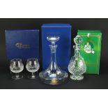 Crystal glassware with boxes comprising a pair of Waterford goblets, Waterford decanter and Sevres