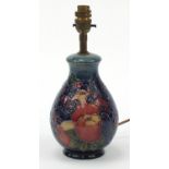 Moorcroft Pottery baluster lamp base hand painted with two birds amongst fruit, 29.5cm high :For