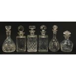Six cut glass decanters including a Royal Brierley example etched with flowers, the largest 26.5cm