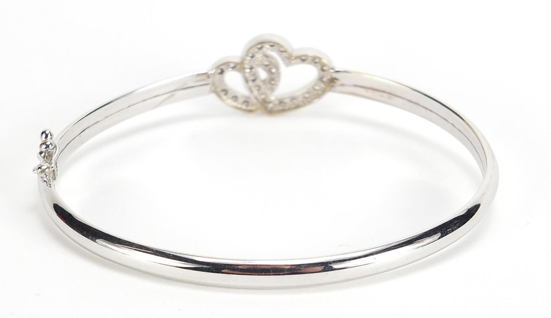 9ct white gold double love heart bangle set with clear stones, 6.5cm wide, 6.2g :For Further - Image 2 of 4