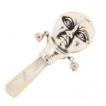 Victorian design sterling silver and mother of pearl moon face babies' rattle, 8cm in length, 13.