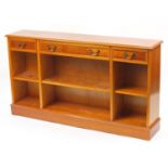 Inlaid yew open bookcase fitted with three drawers above three adjustable shelves, 84.5cm H x