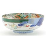 Japanese porcelain bowl hand painted with a dragon amongst clouds, character marks to the underside,