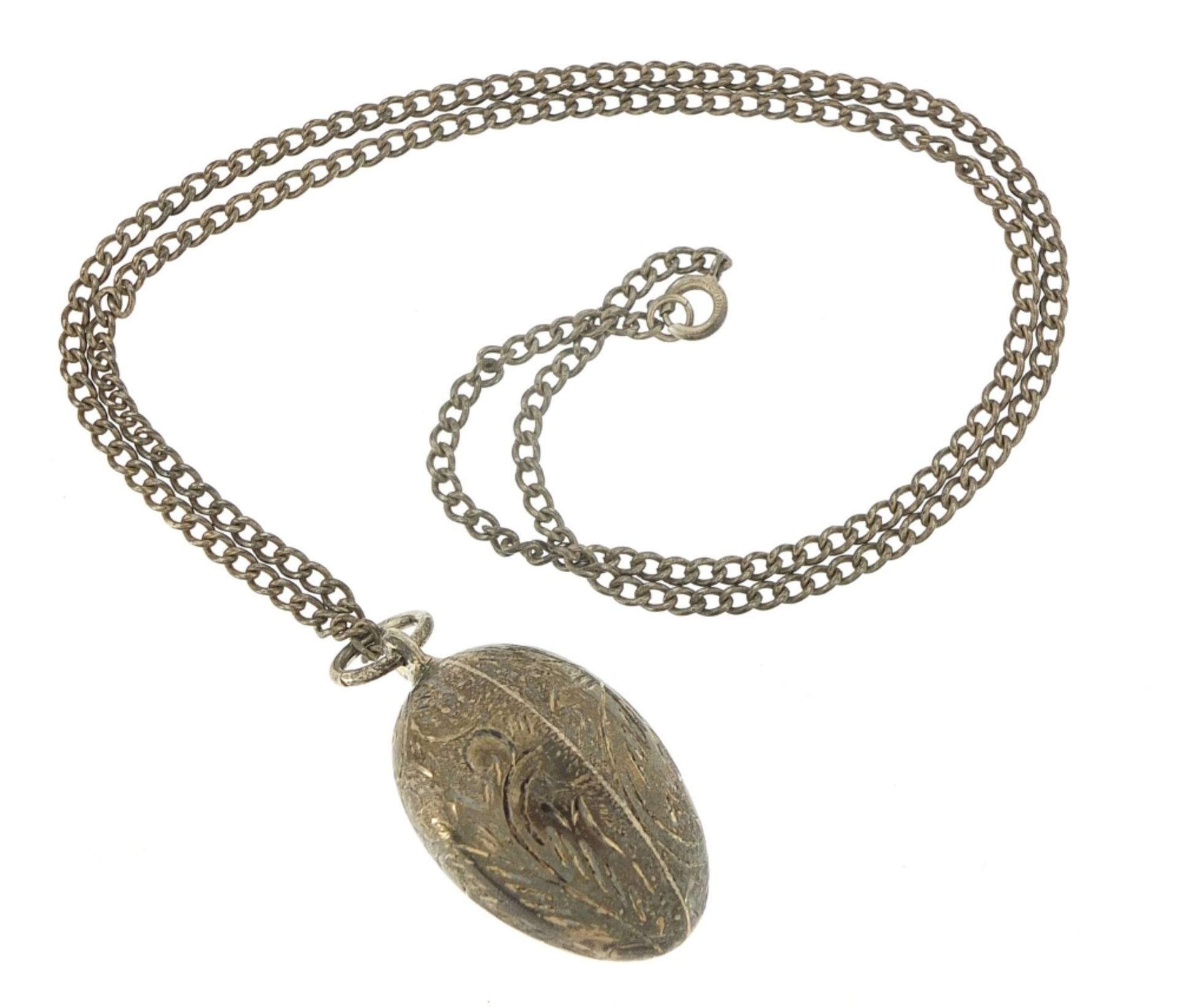 Silver engraved egg pendant on a sterling silver necklace, 4cm high and 56cm in length, total 19. - Image 2 of 4
