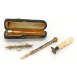 Objects including Victorian gold coloured metal propelling pencil with citrine top, 9ct gold