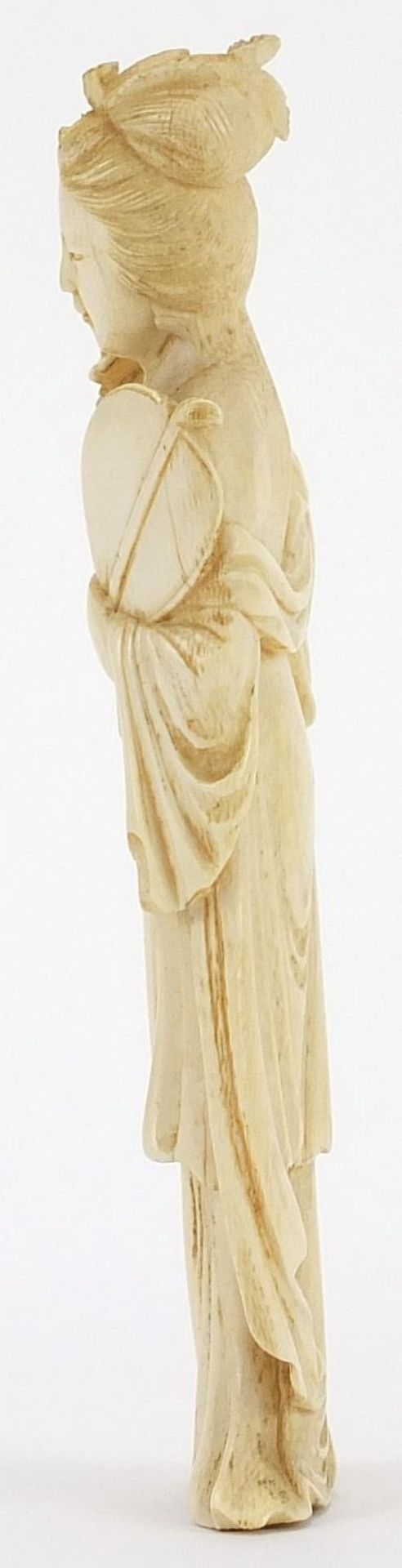 Japanese carved ivory okimono of a young female holding a fan and flowers, 18cm high :For Further - Image 2 of 6