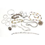 Silver jewellery including amber coloured necklace, hardstone brooches, bracelets and a pair of