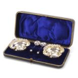 John Millward Banks, pair of Victorian silver open table salts with spoons housed in a velvet and