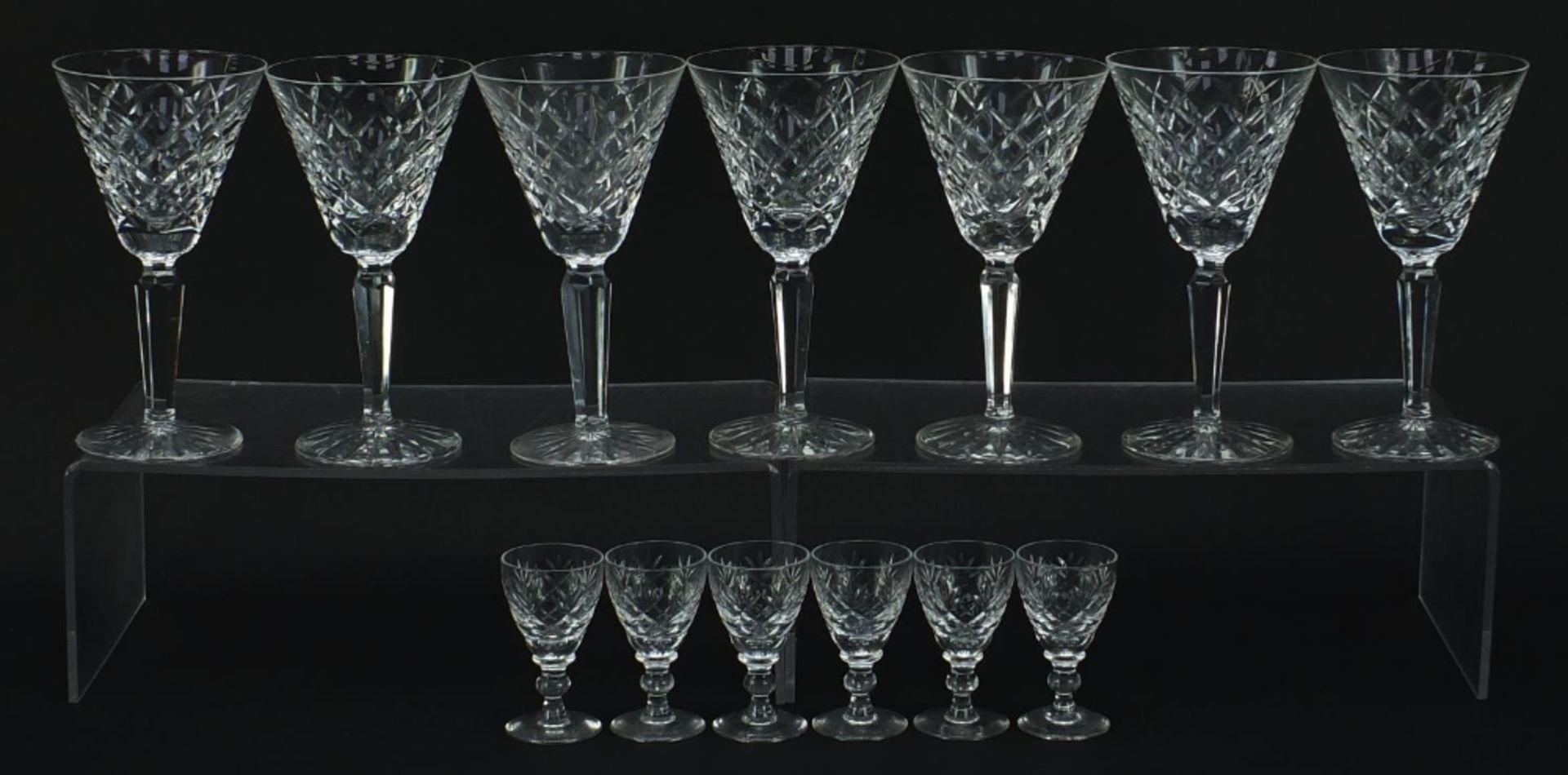 Seven Waterford Crystal wine glasses and set of six Webb & Corbett liqueur glasses, the largest 16.