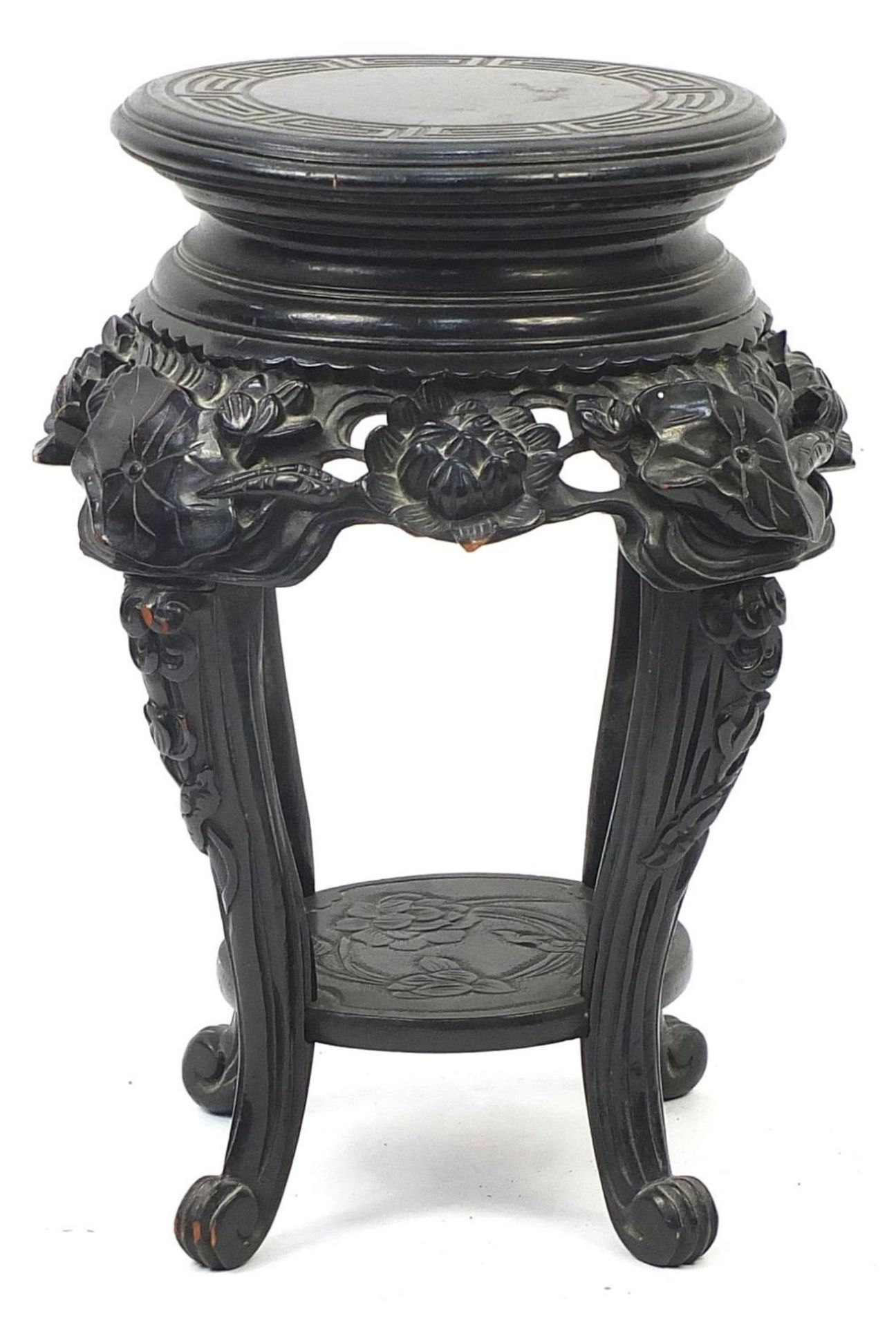 Chinese hardwood stand with under tier carved with flowers, 50cm high x 30cm in diameter :For