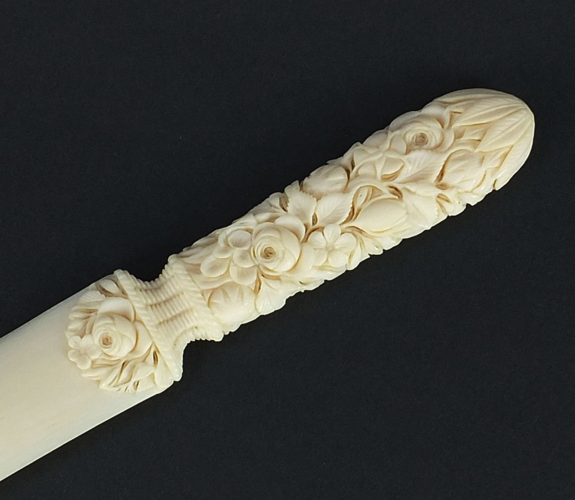 Victorian carved ivory page turner finely carved with foliage, 24.5cm in length :For Further