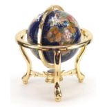 Brass and specimen stone table globe with compass under tier, 35cm high :For Further Condition