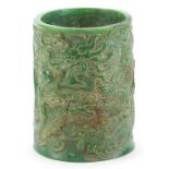Chinese green jade brush pot carved with a dragon and phoenix chasing a flaming pearl, 15cm high :