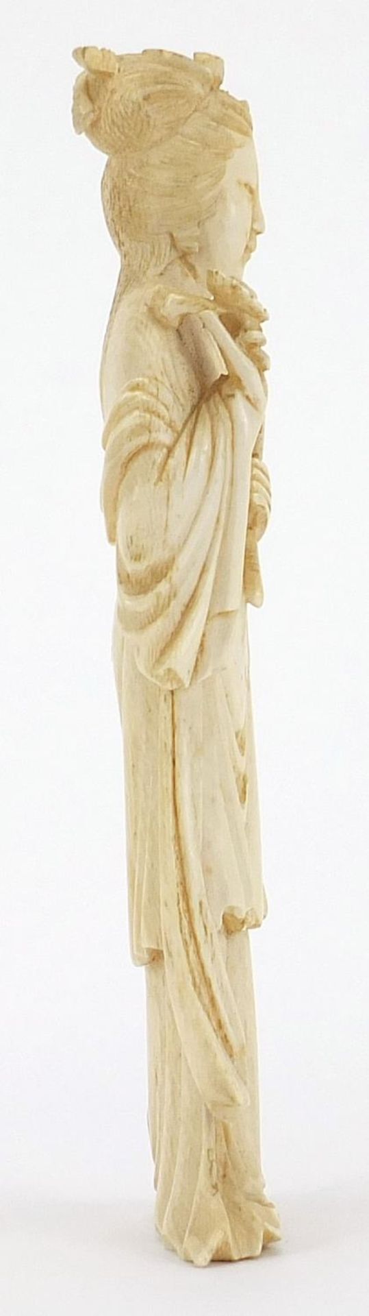 Japanese carved ivory okimono of a young female holding a fan and flowers, 18cm high :For Further - Image 4 of 6