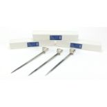 Three Wilkinson Sword letter openers with boxes, each 22cm in length :For Further Condition