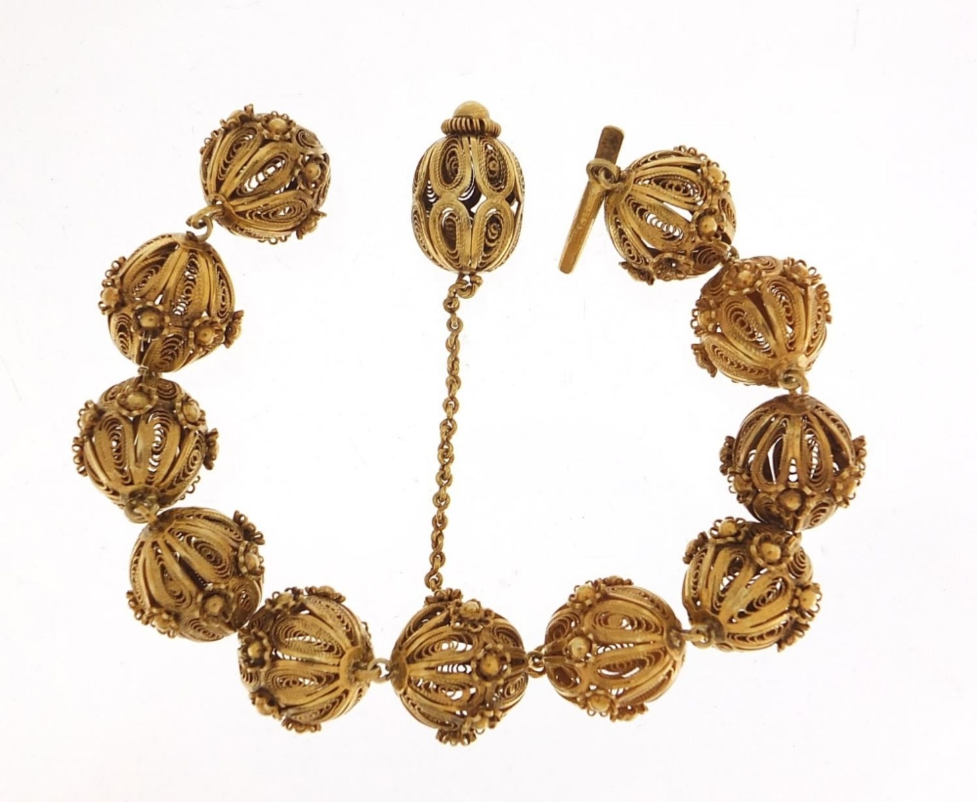 Unmarked gilt metal filigree ball bracelet, 20cm in length, 31.2g :For Further Condition Reports - Image 3 of 4