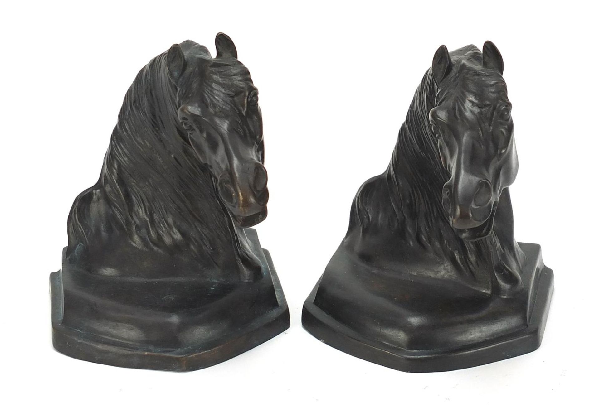 Pair of patinated bronze horse head design bookends, each 14.5cm high :For Further Condition Reports
