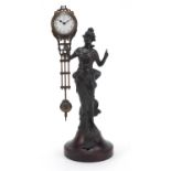 Bronzed mystery clock in the form of an Art Nouveau female, with enamelled dial and Arabic numerals,