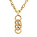 9ct gold diamond three stone pendant on a 9ct gold necklace, 2cm high and 50cm in length, total 7.1g