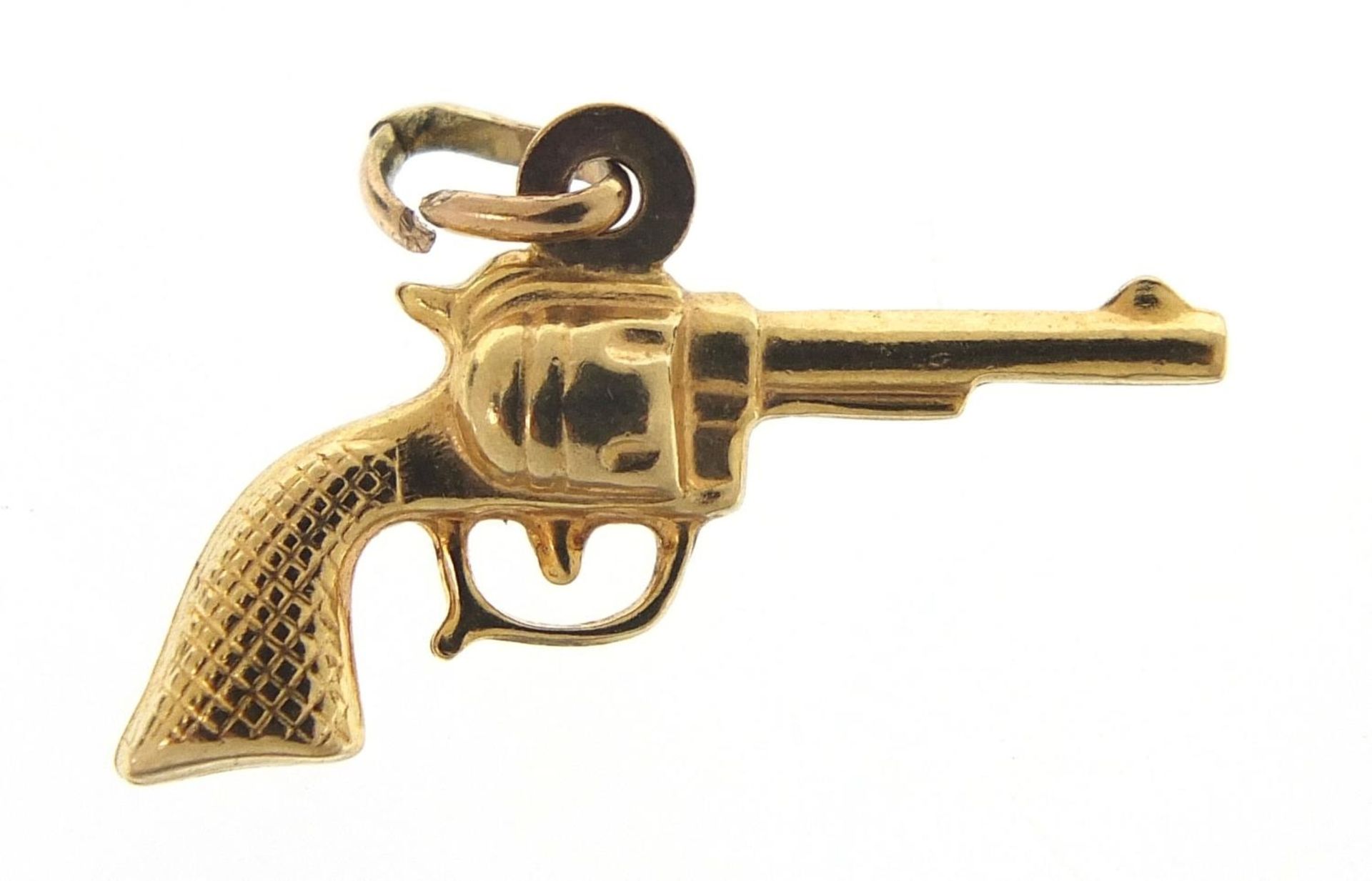 9ct gold revolver pistol charm, 2.4cm in length, 1.1g :For Further Condition Reports Please Visit - Image 2 of 3