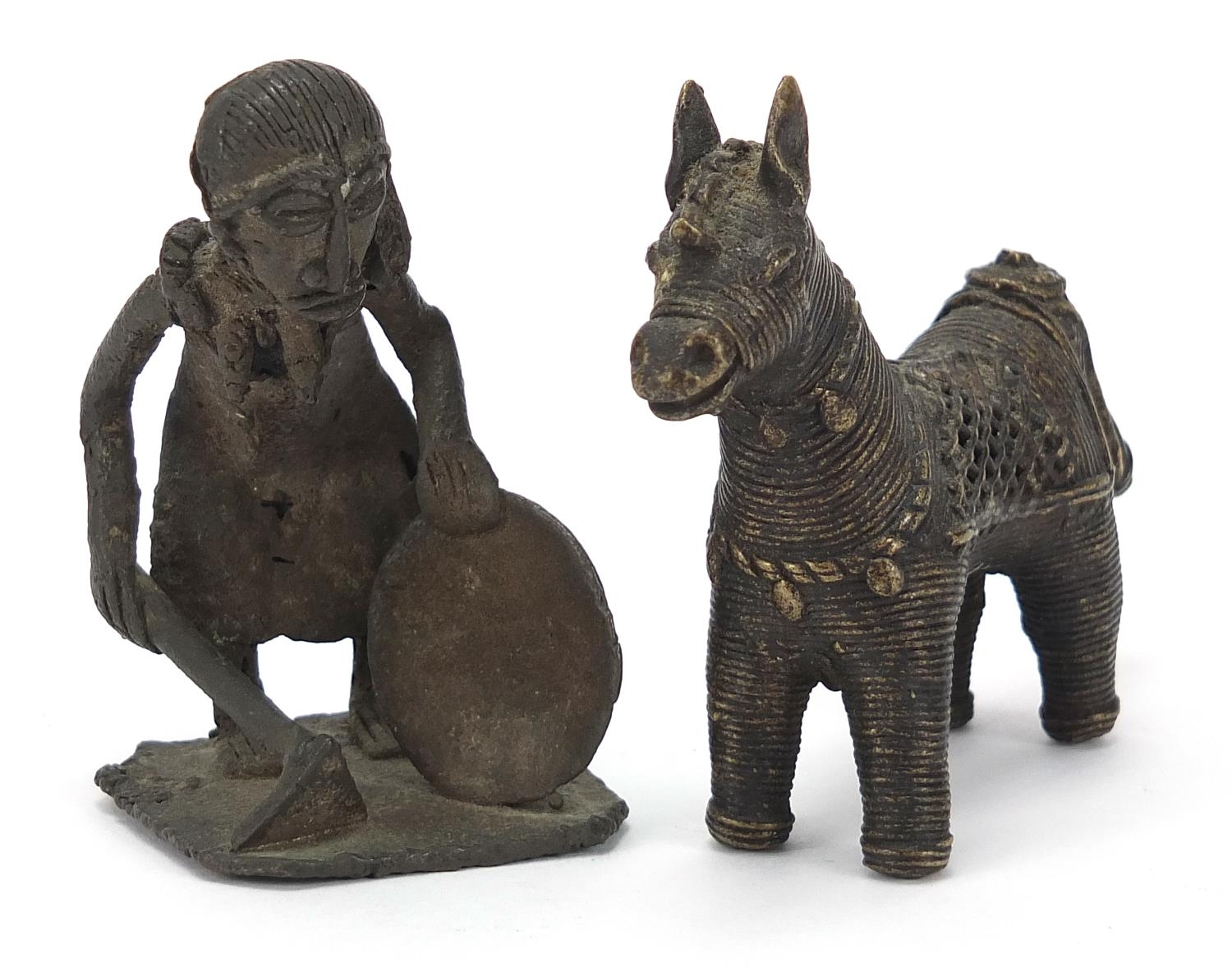 Two African Benin style bronzes including a mother with child, the largest 7.5cm high :For Further