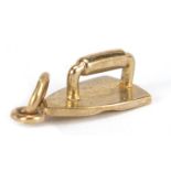 9ct gold iron charm, 1.2cm in length, 1.1g :For Further Condition Reports Please Visit Our