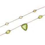 Unmarked white metal peridot necklace, 40cm in length, 14.6g :For Further Condition Reports Please