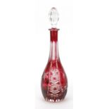 Bohemian ruby flashed cut glass decanter etched with leaves and berries, 39.5cm high :For Further