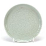 Good Chinese porcelain footed dish having a celadon glaze, finely decorated in low relief and