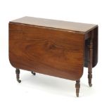 Victorian mahogany Pembroke table with brass castors, 72cm H x 91cm W x 34cm D when closed :For