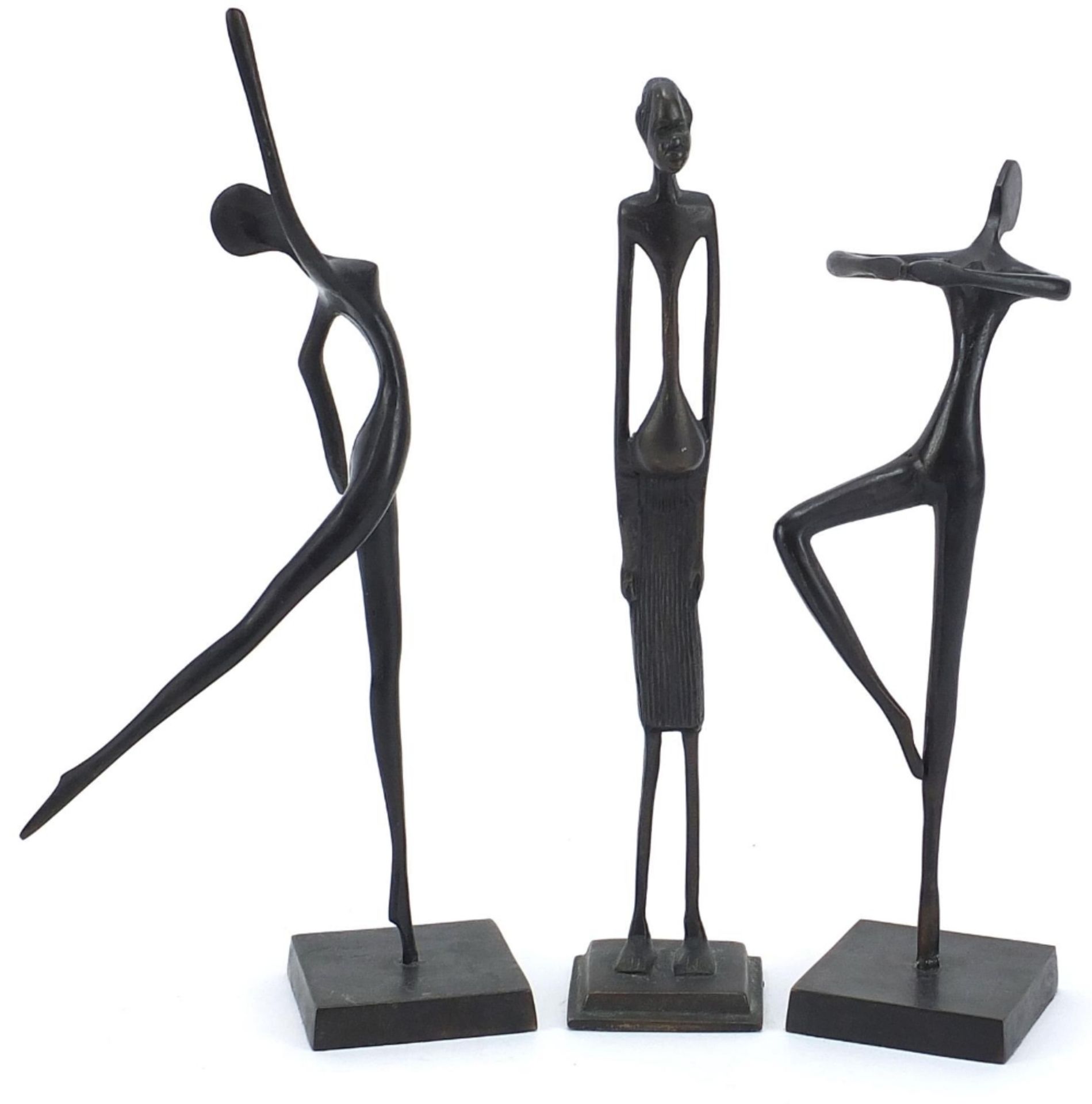 Pair of Modernist bronzed sculptures of dancers and one other, the largest 34cm high :For Further