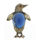 Unmarked silver penguin brooch set with a cabochon blue stone and clear stones, 2.4cm high, 4.8g :