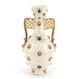 Zsolnay Pecs, Hungarian vase with twin handles decorated in relief with stylised flower heads,