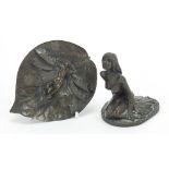 Two Art Nouveau style bronzed sculptures including a fairy reclining on a lily pad, the largest 12.