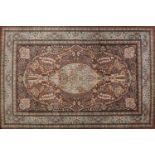 Rectangular Persian rug having an all over floral design with traditional medallion, 224cm x