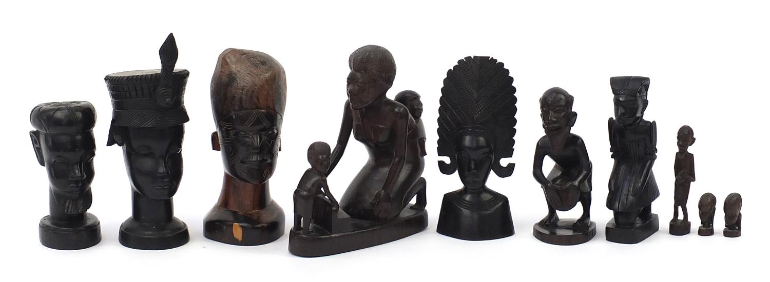 Ten African carved hardwood figures and busts including ebony examples, the largest 28.5cm high :For