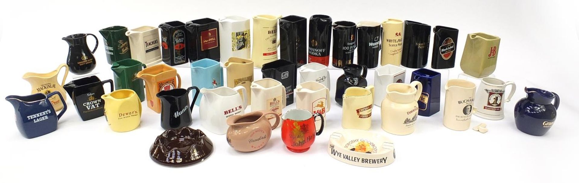 Collection of Breweranalia advertising jugs including Bells, Johnnie Walker and Teachers :For