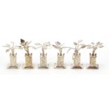 Set of six Chinese unmarked silver miniature trees, possibly menu or place card holders, 3.5cm high,
