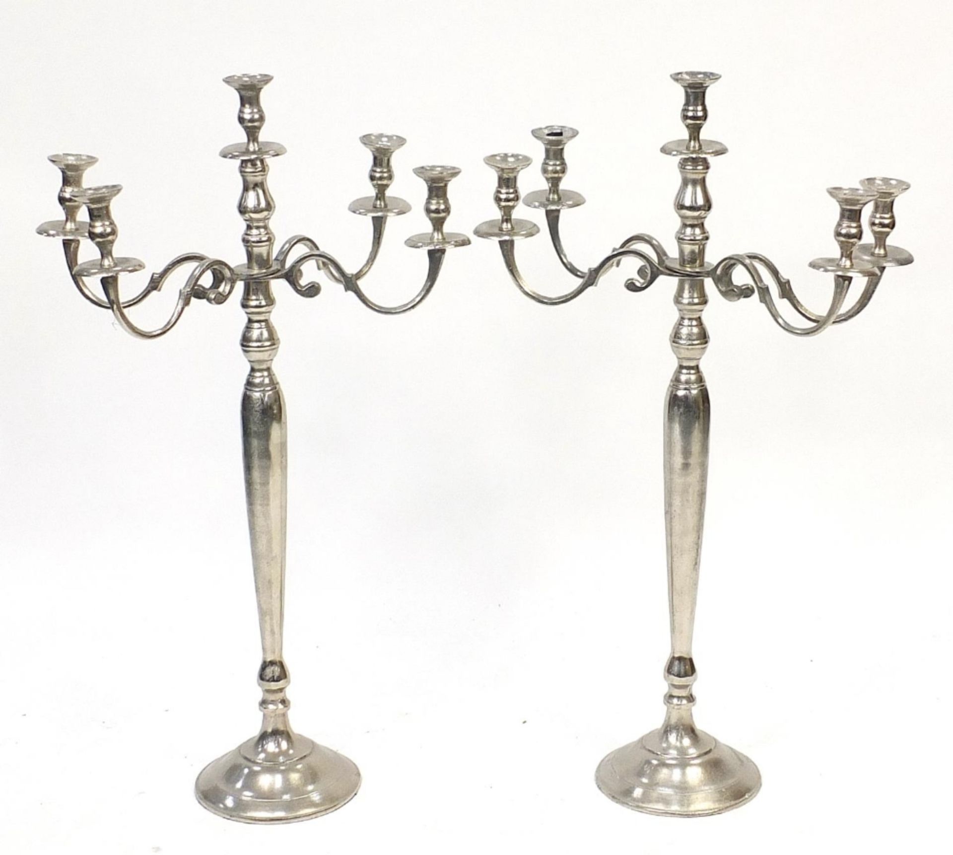 Pair of floor standing chrome plated five branch candelabras, each 99cm high :For Further