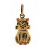 9ct gold and enamel seated cat charm, 1.5cm high, 0.6g :For Further Condition Reports Please Visit