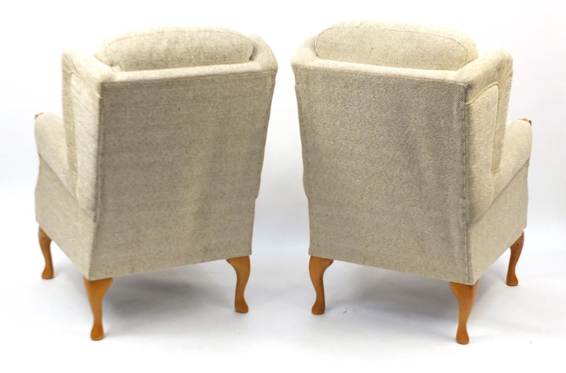 Pair of wingback armchairs with beige upholstery, raised of cabriole legs, 110cm high - Image 3 of 3