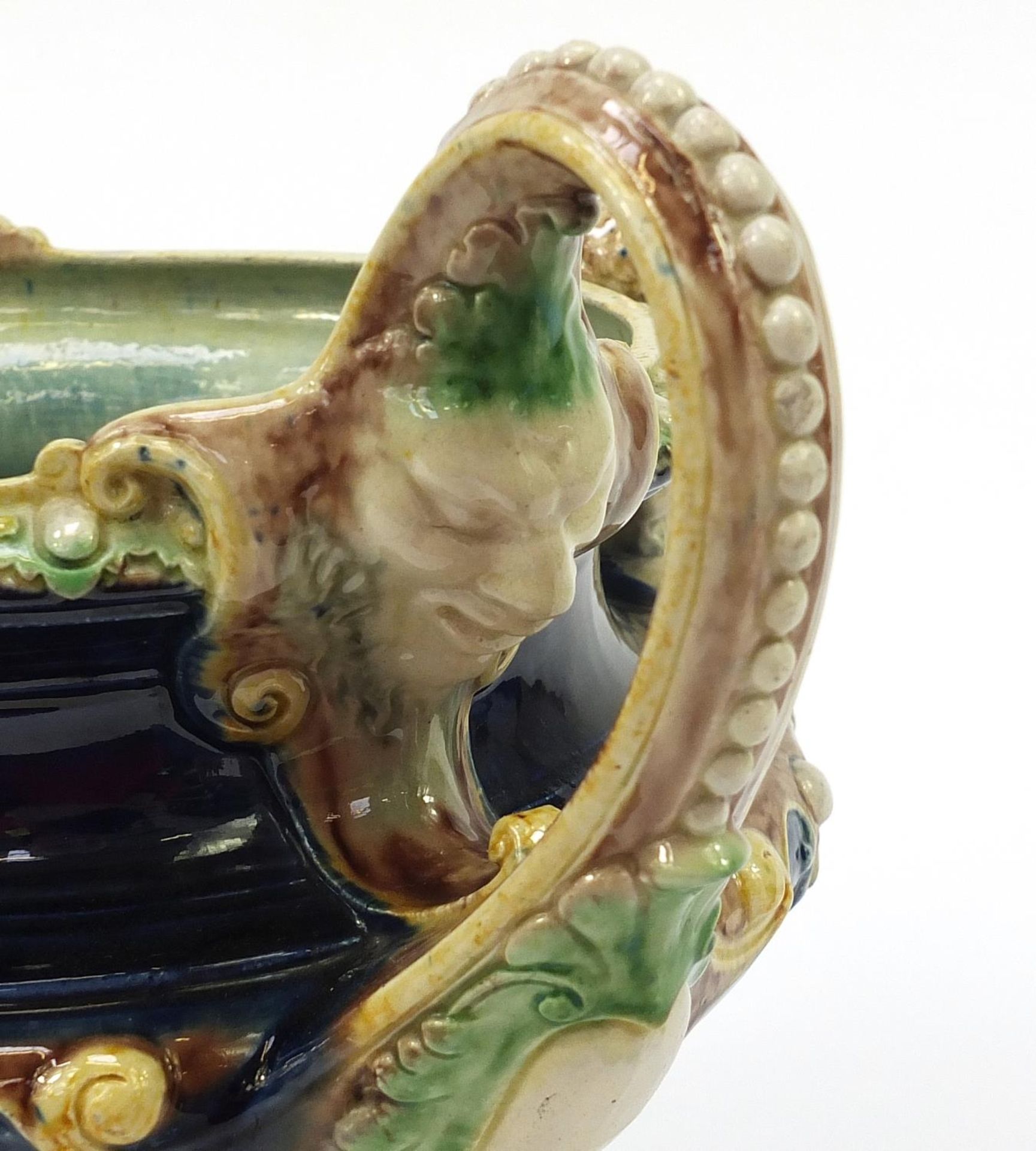 19th century Majolica centrepiece with twin handles surmounted with two Putti, 27.5cm high x 33. - Bild 6 aus 6