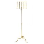 Victorian brass telescopic adjustable music stand with paw feet, tallest 156.5cm high :For Further