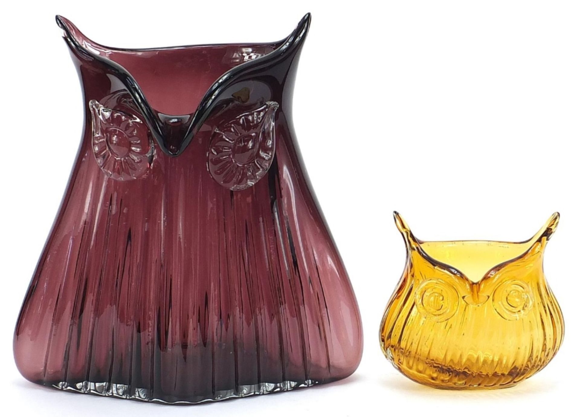 Two novelty art glass owl vases including an amethyst coloured example, 25cm high :For Further