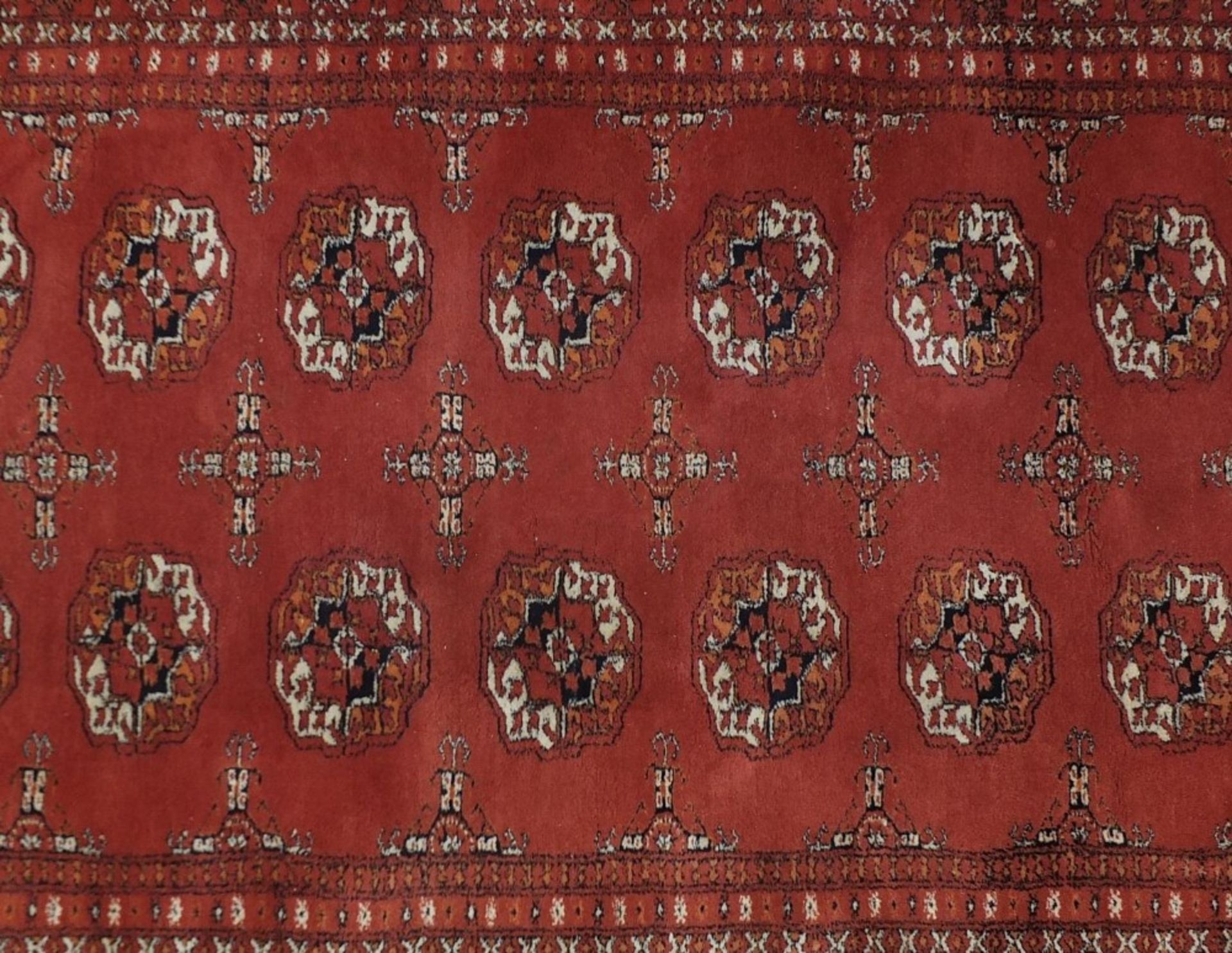 Rectangular Persian rug having a traditional repeat medallion, 200cm x 125cm :For Further - Image 2 of 4