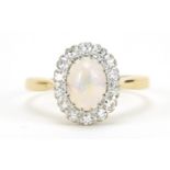 18ct gold cabochon opal and diamond ring, housed in a Hatton Diamonds jeweller's box, the diamonds